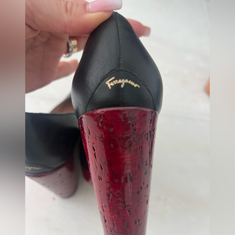 Gently used Ferragamo black pump wedge